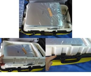 スーツケースに入った精密機器(映写機)の固定用梱包材3