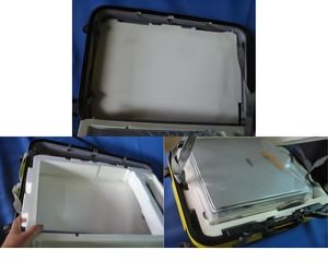 スーツケースに入った精密機器(映写機)の固定用梱包材4